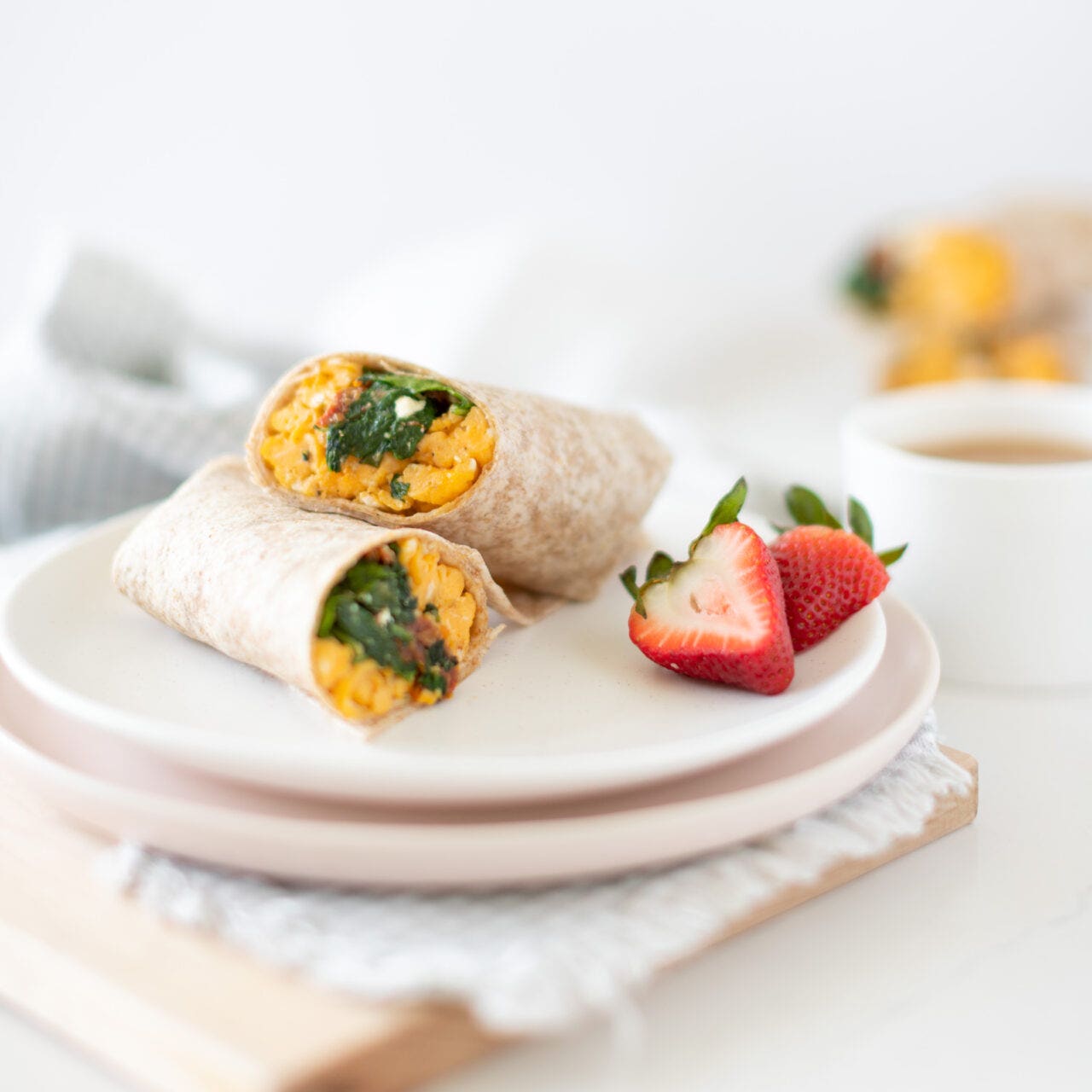 spinach and feta wrap with egg and strawberries