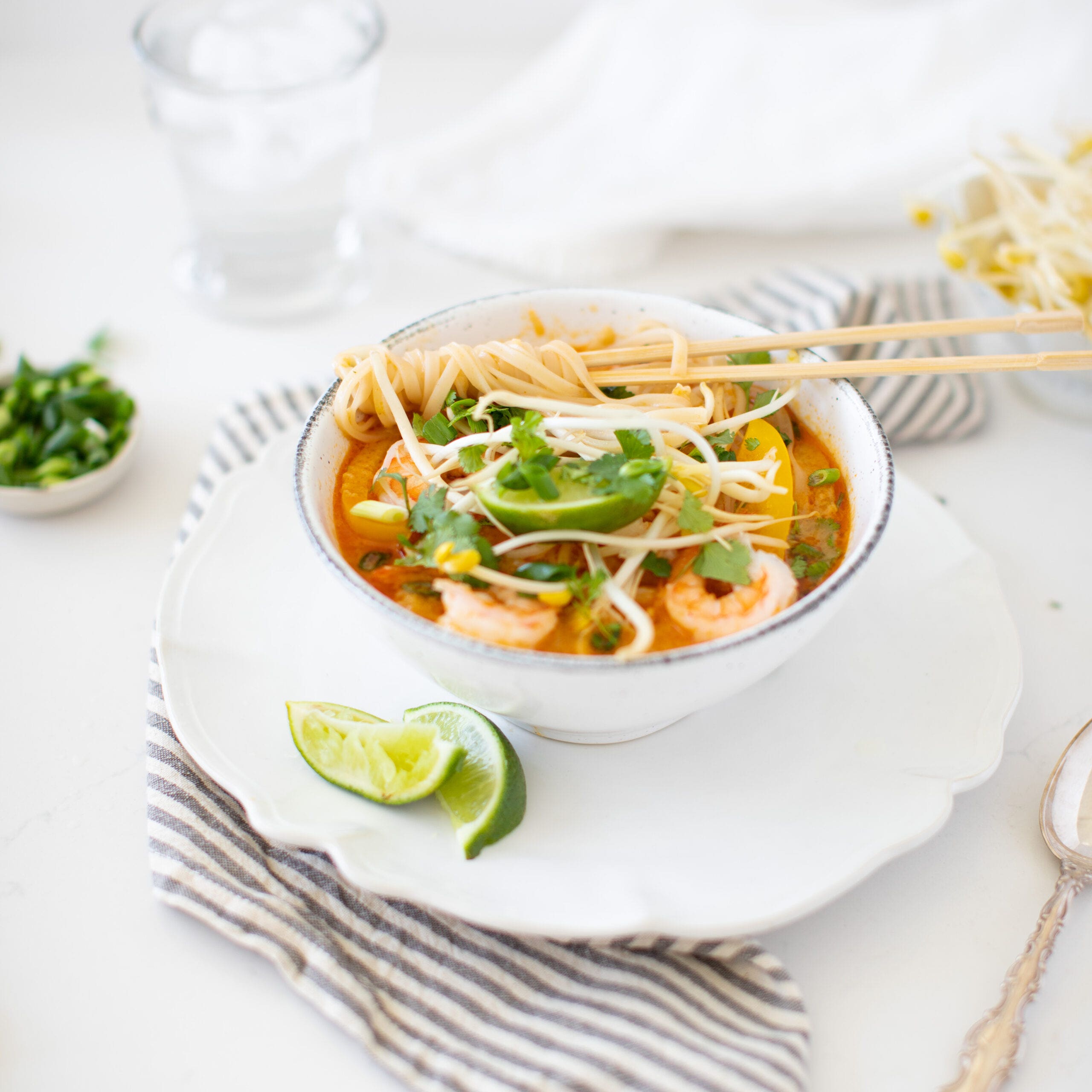 bowl of coconut curry noodles with shrimp