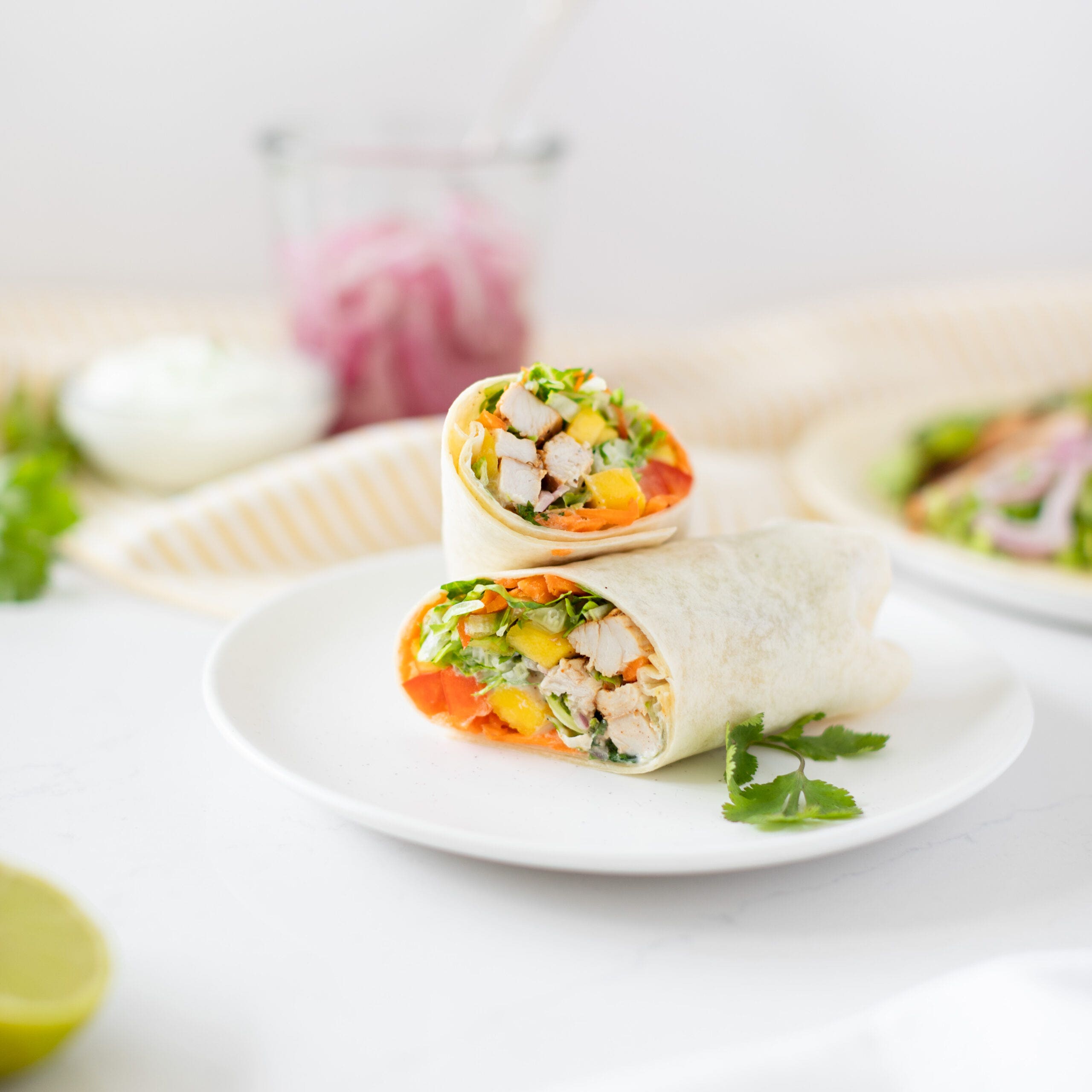 chicken and mango wraps with colourful veggies