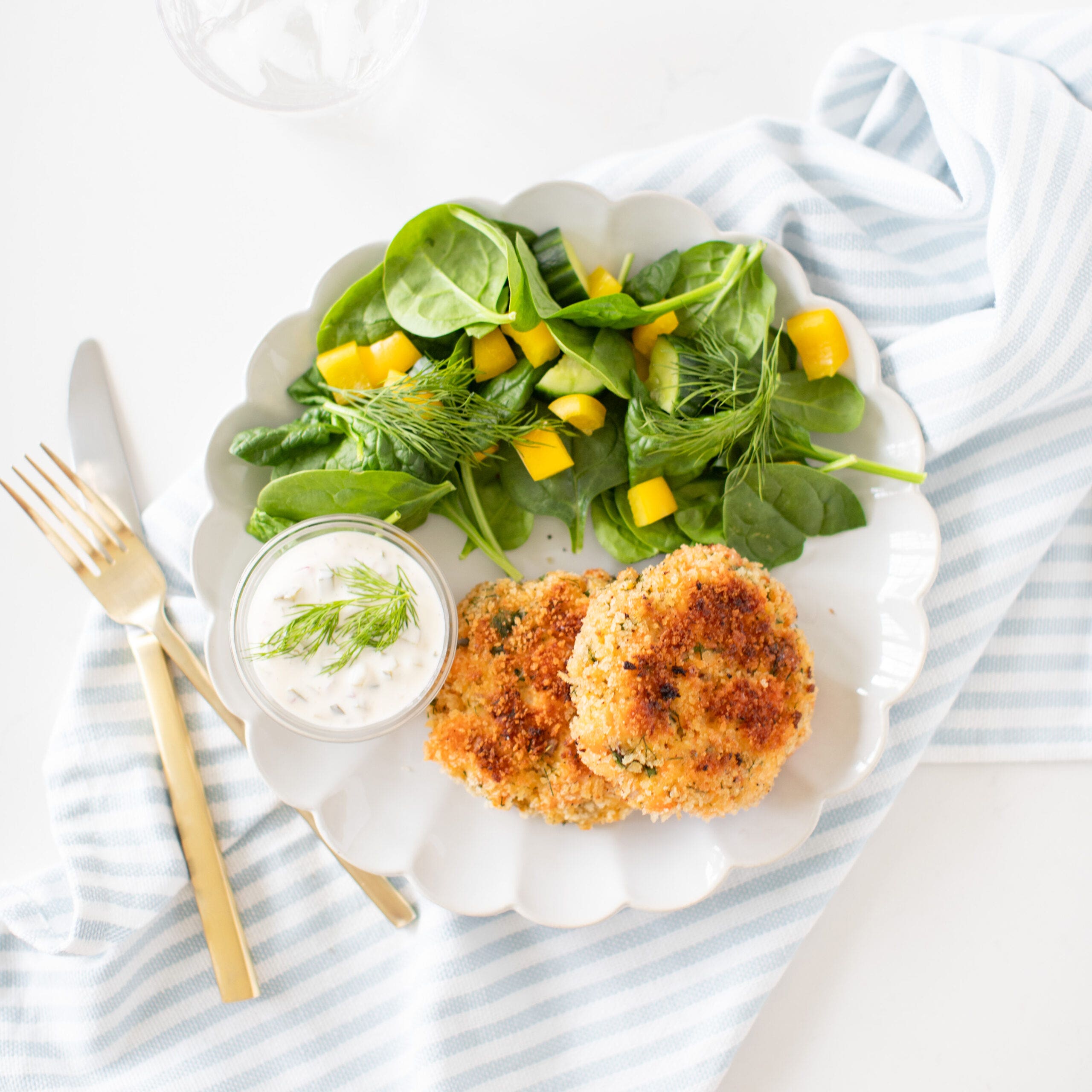 2 salmon cakes with salad