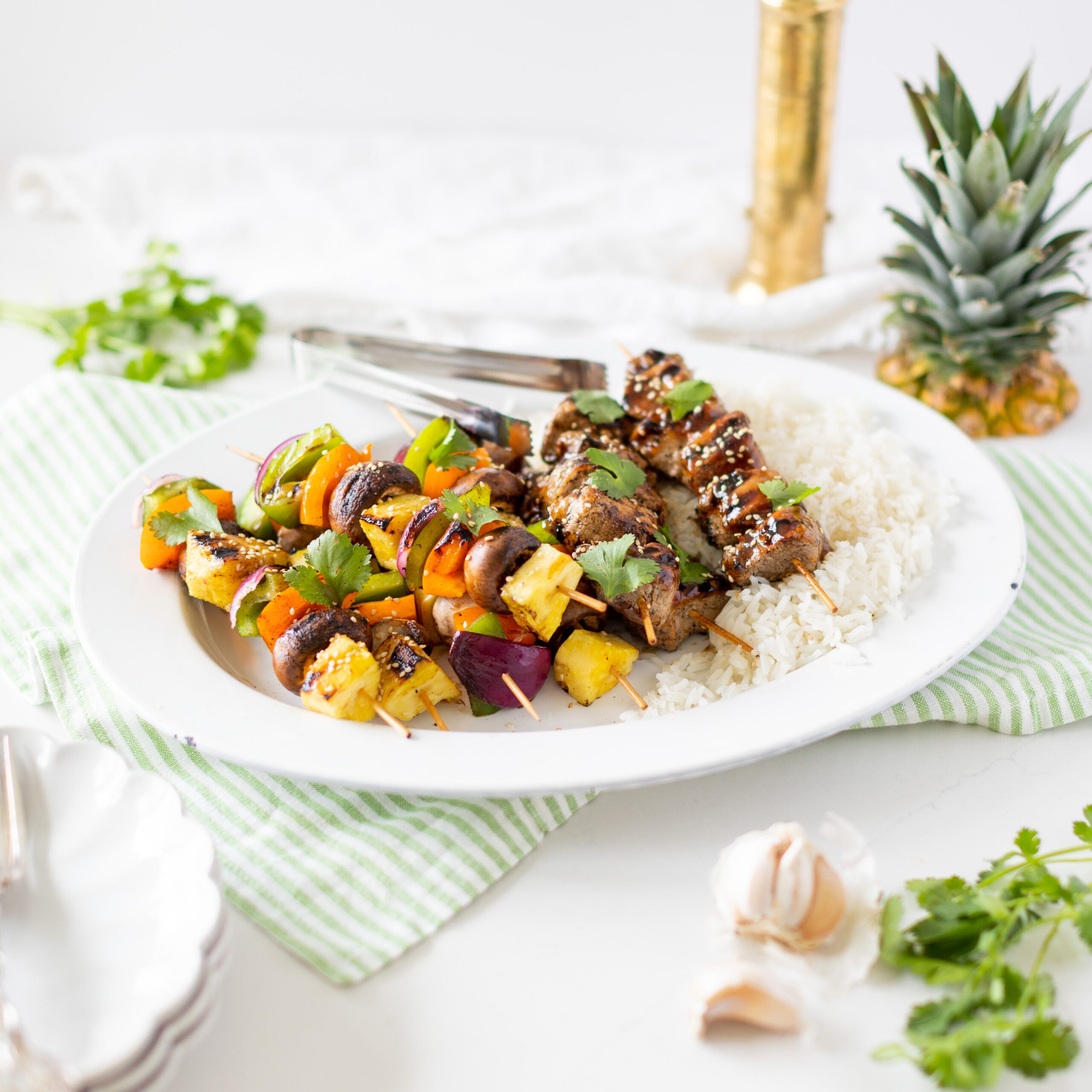 vegetable and pork skewers with rice