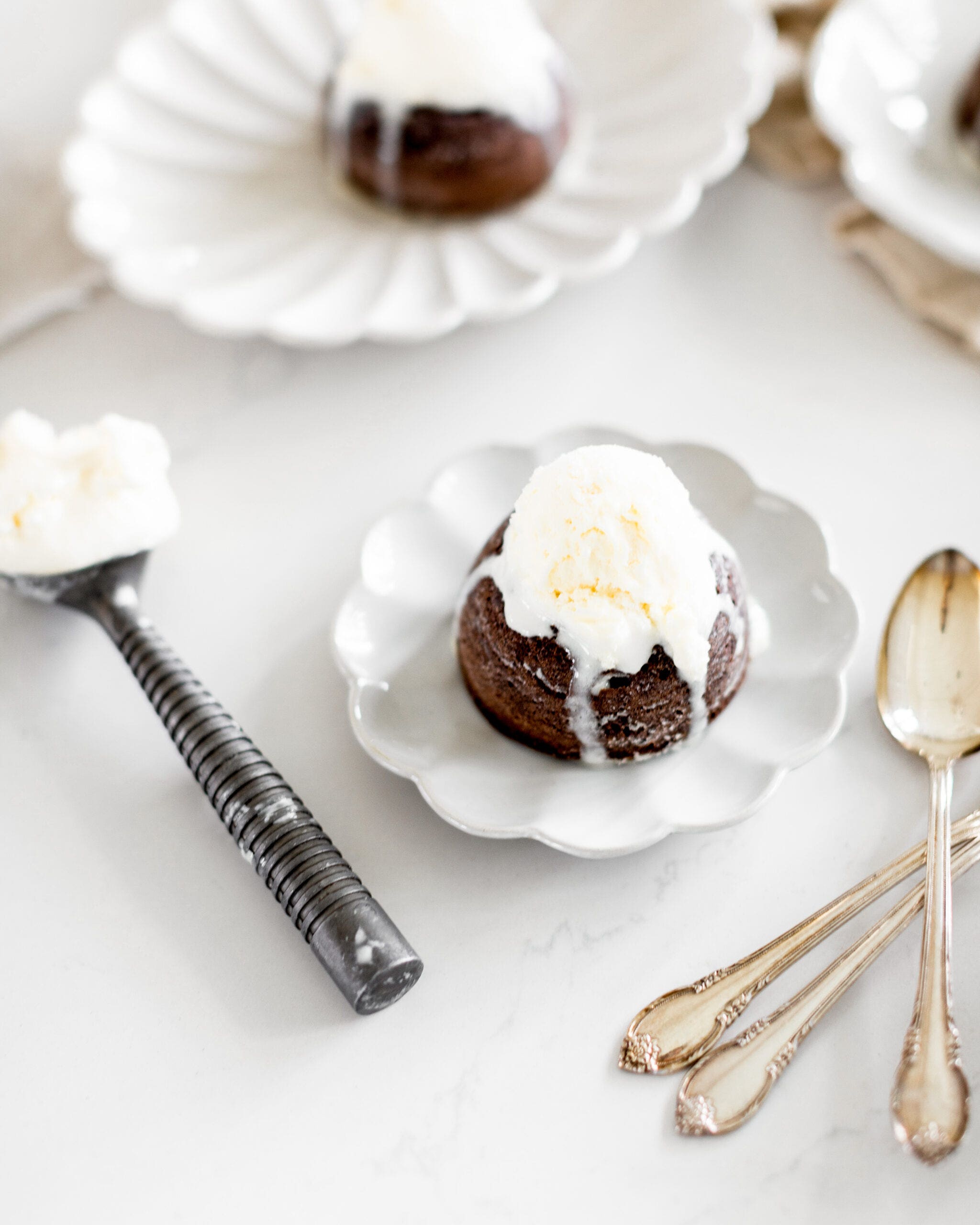 chocolate cakes with ice cream on top